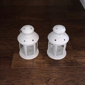 Two white decor candle lanterns
